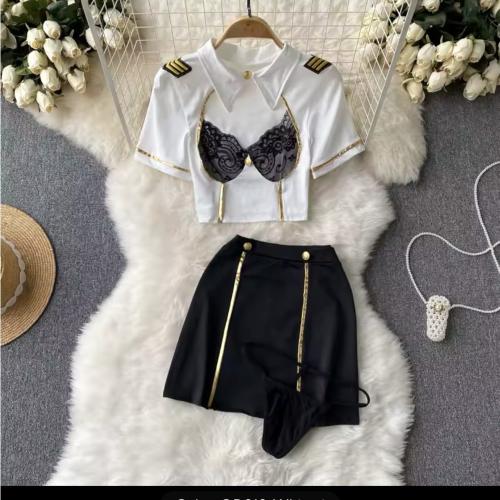 White and Black Pilot Costume with Gold Accents